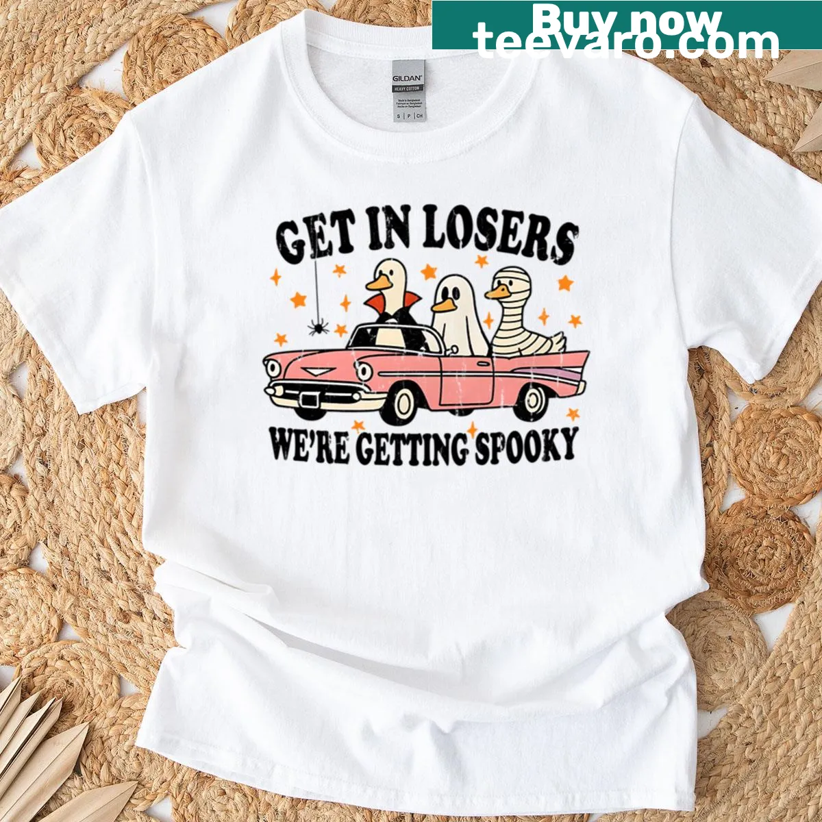 Spooky themed t-shirt with 'Get In Losers, We’re Getting Spooky' text — on a men's t-shirt