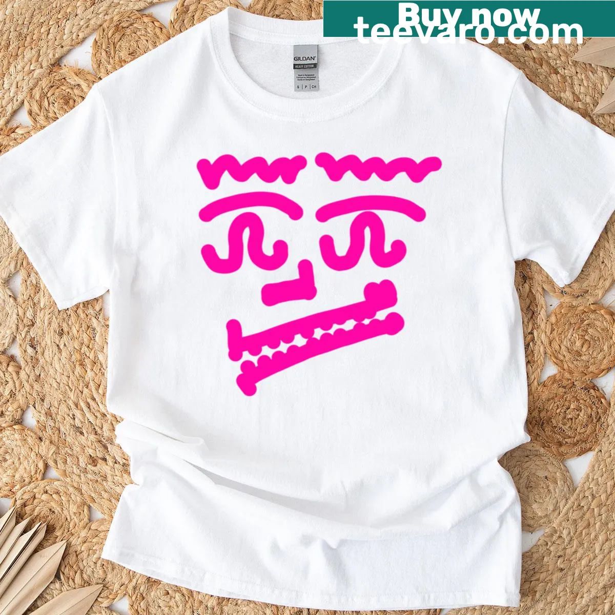 Neon pink abstract face design on a minimalist t-shirt — on a men's t-shirt
