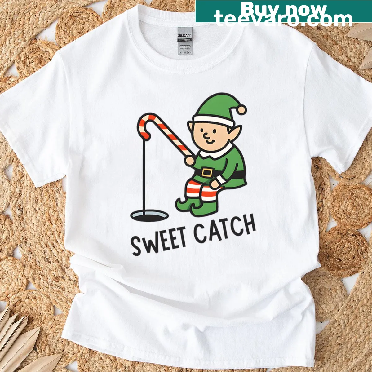 Cartoon elf ice fishing with a candy cane graphic — on a men's t-shirt