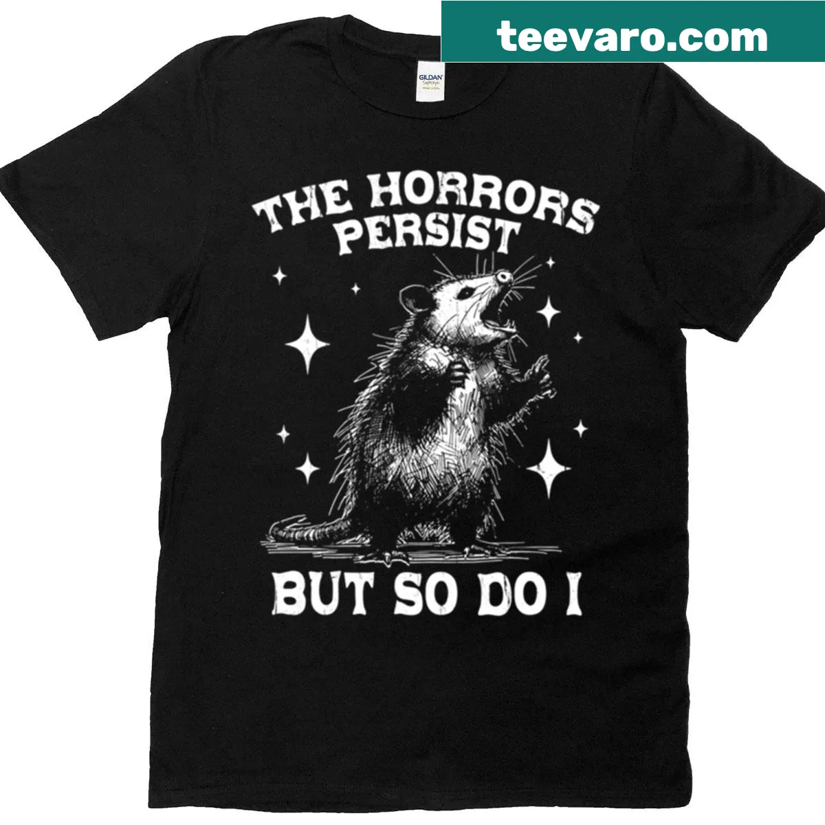 Bold text design on a T-shirt stating 'The Horrors Persist But So Do I' — on a men's t-shirt