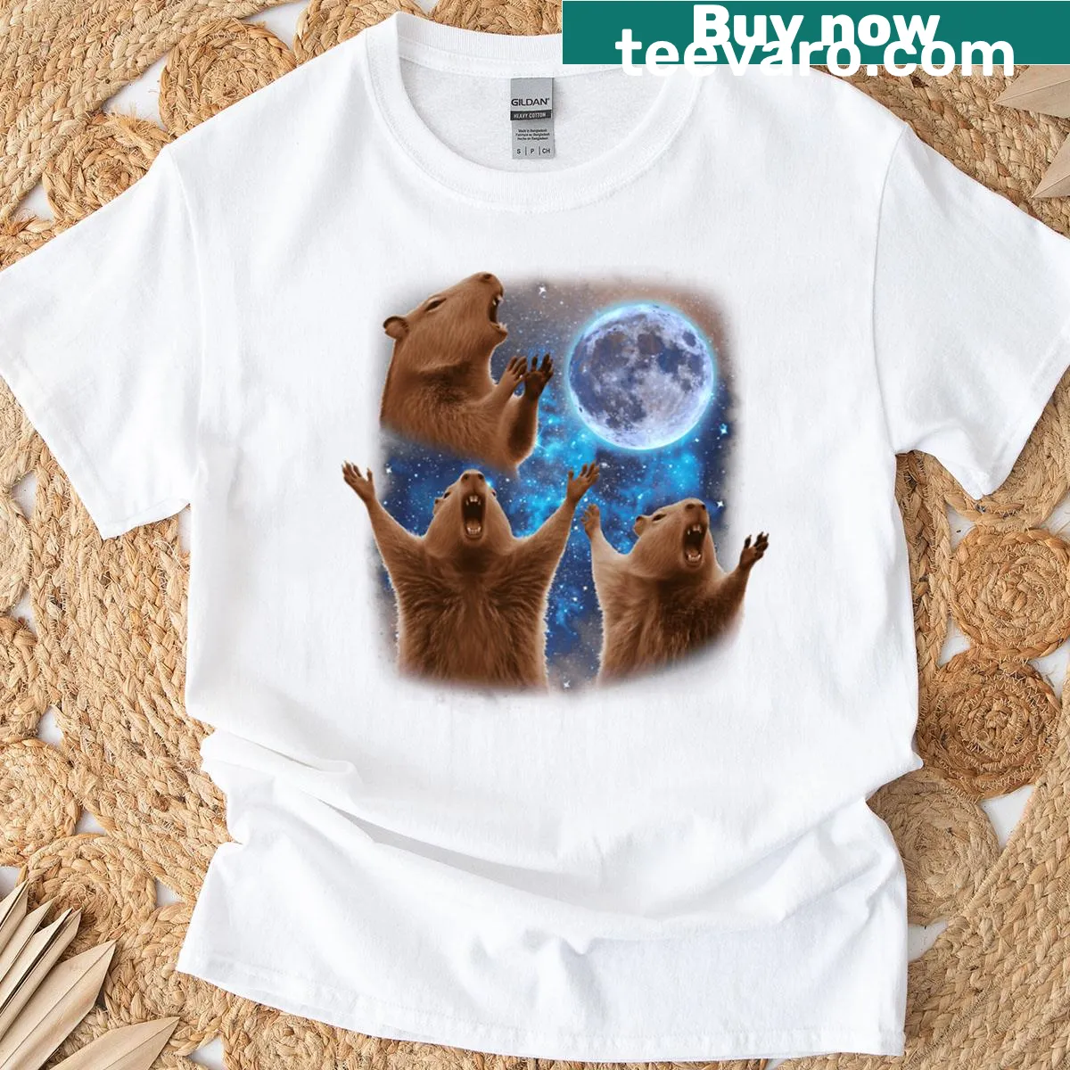 Three capybaras howling at the moon graphic T-shirt — on a men's t-shirt