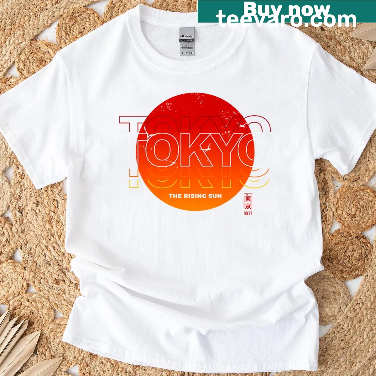 Illustrative T-shirt featuring Tokyo and rising sun elements. — on a men's t-shirt
