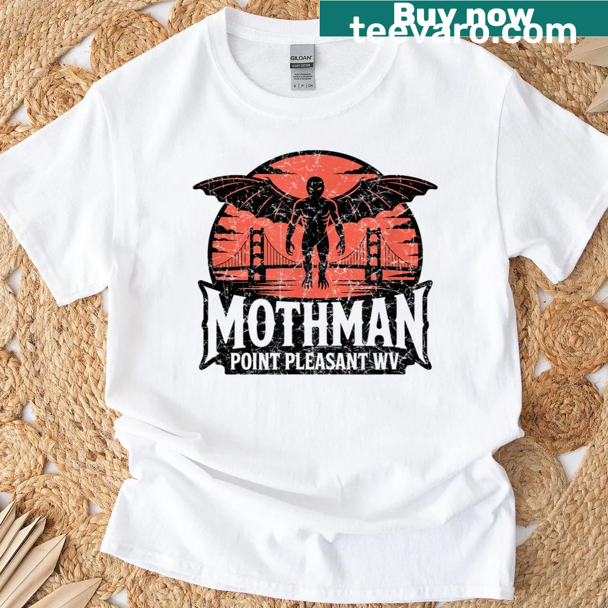 Vintage-style t-shirt featuring a depiction of Mothman — on a men's t-shirt
