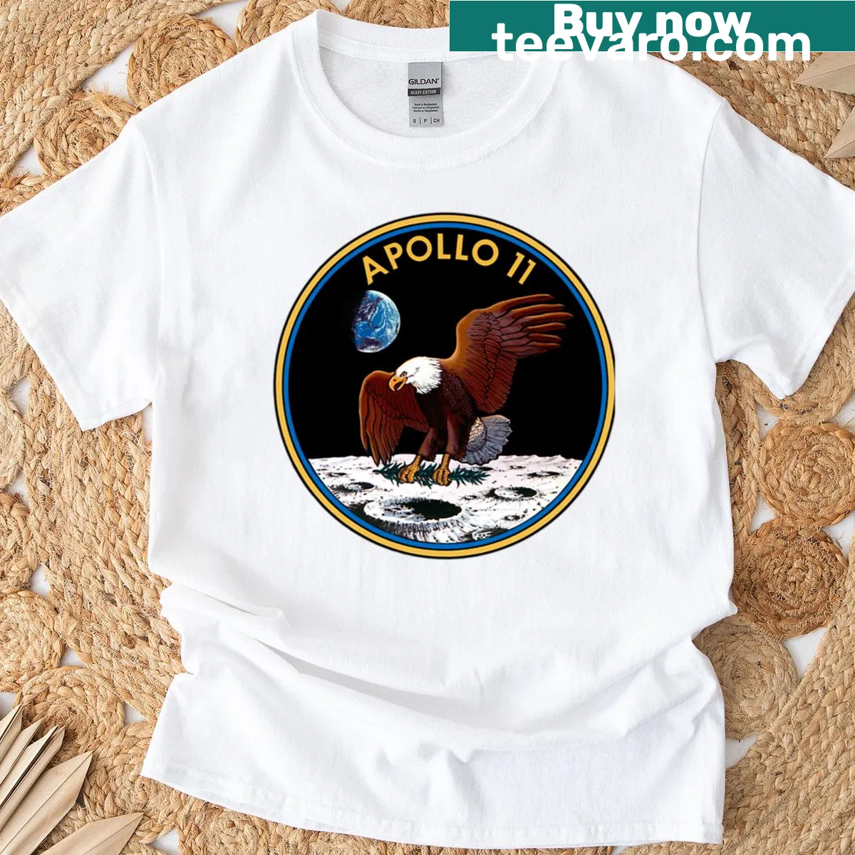 T-shirt featuring the Apollo 11 mission logo — on a men's t-shirt