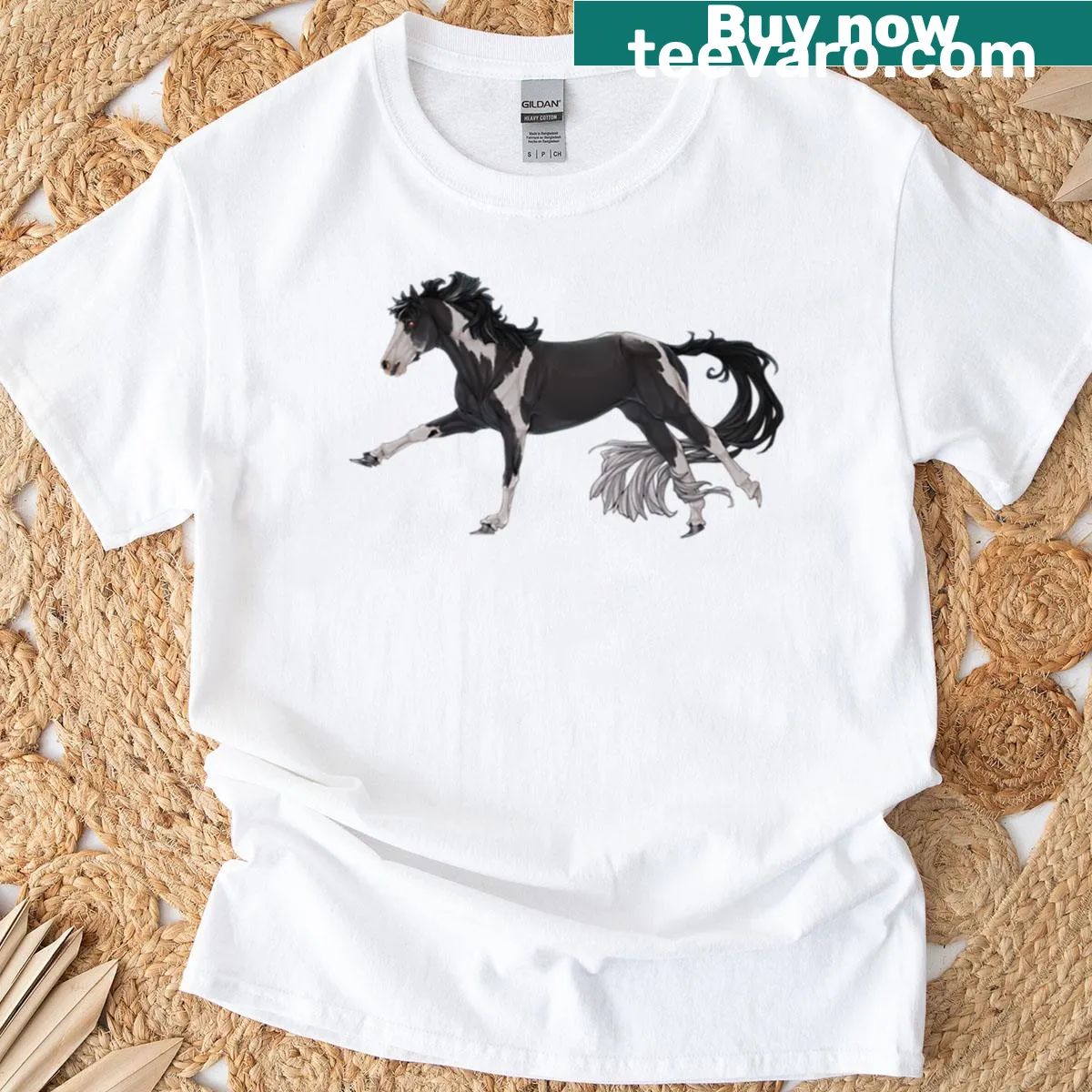 Galloping black and white paint horse graphic on T-shirt — on a men's t-shirt