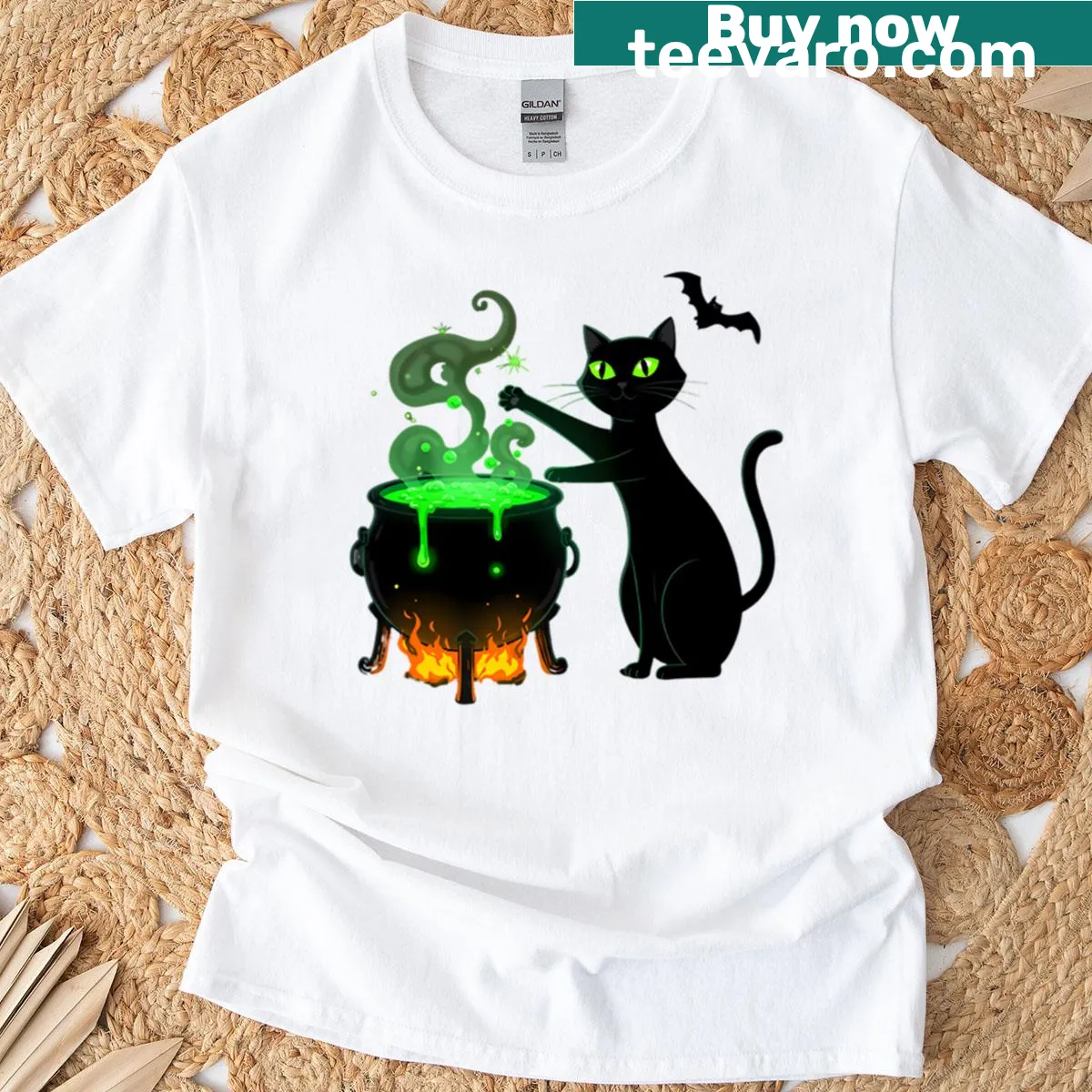 Whimsical Halloween T-shirt with black cat and cauldron — on a men's t-shirt