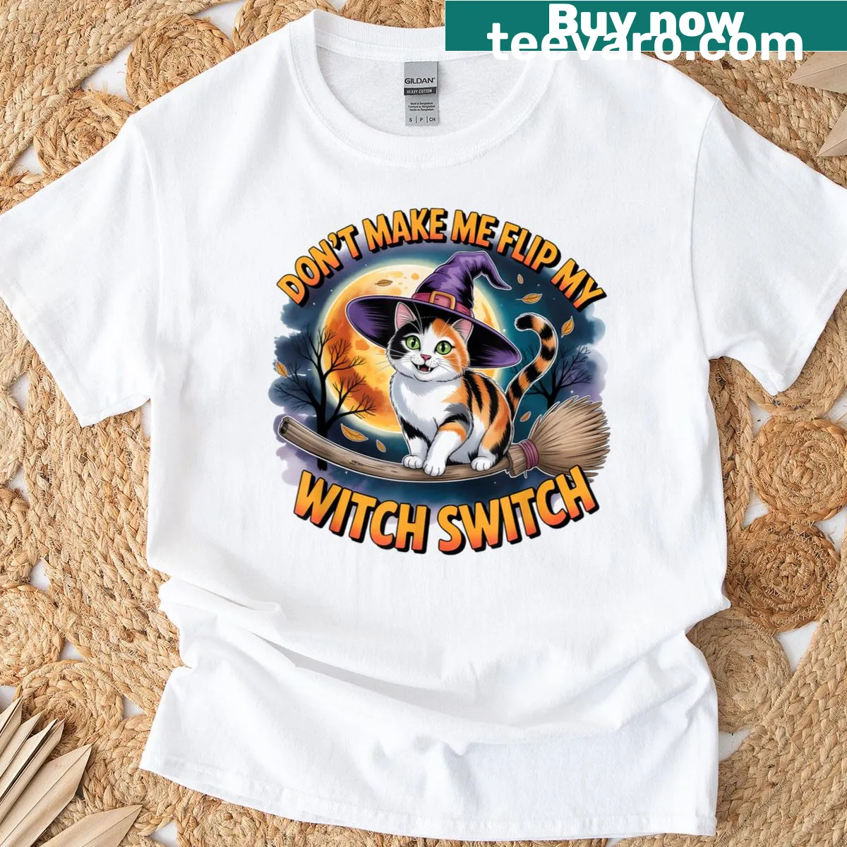 Calico cat in a witch hat for Halloween with a humorous design — on a men's t-shirt