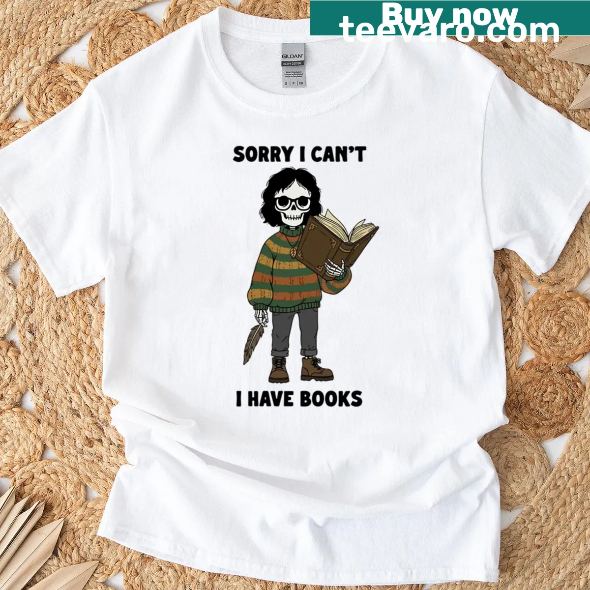 Cute Halloween T-shirt featuring a bookworm skeleton design — on a men's t-shirt
