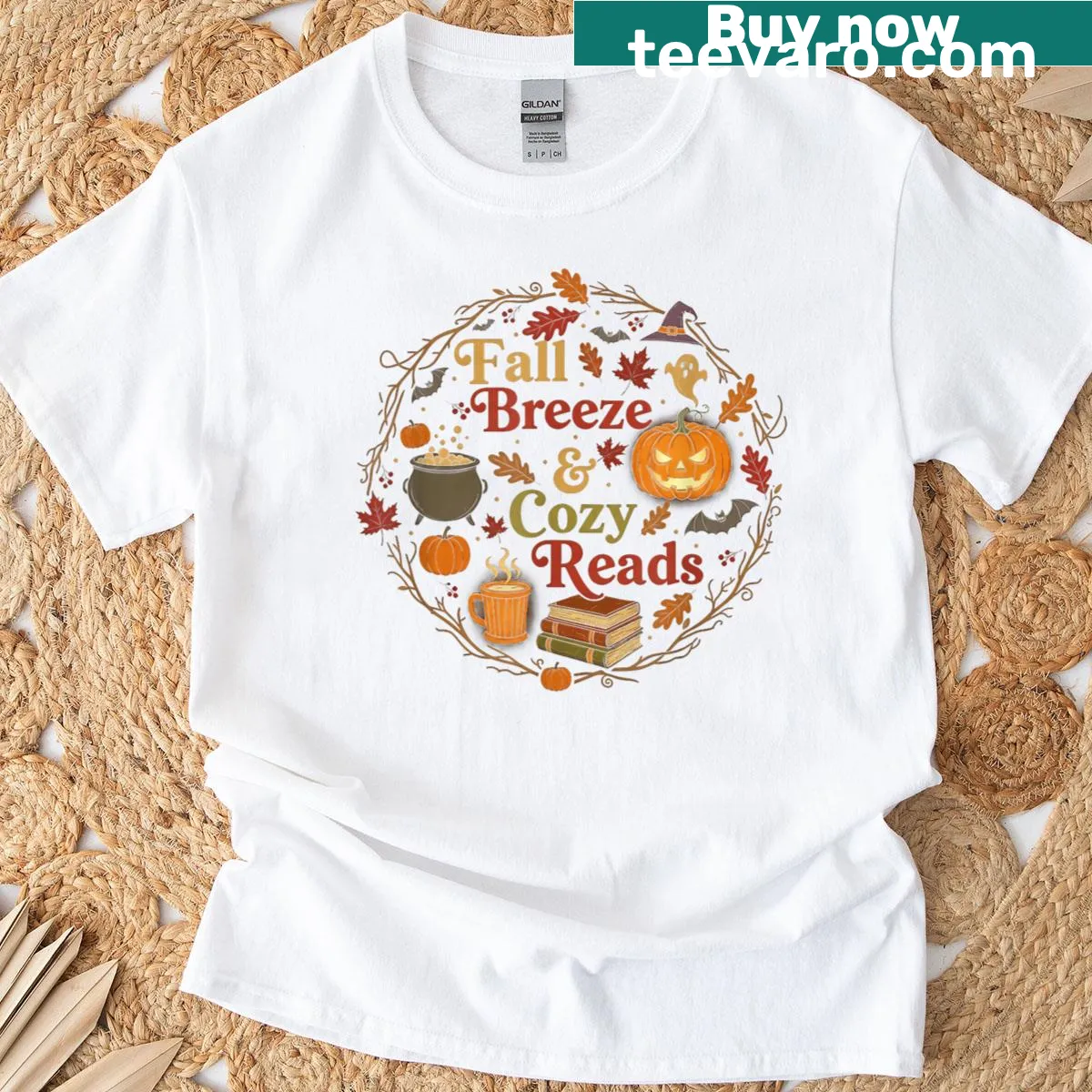Funny book lover t-shirt with autumn and Halloween themed graphics — on a men's t-shirt