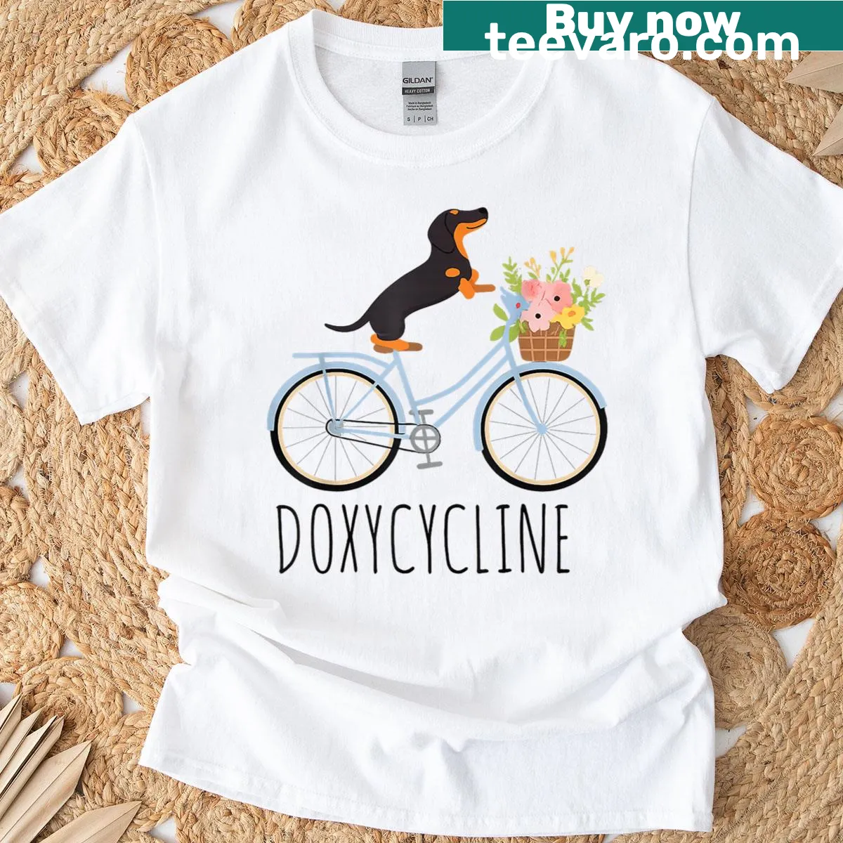 Funny T-shirt with a dachshund on a bicycle and pharmacy pun — on a men's t-shirt