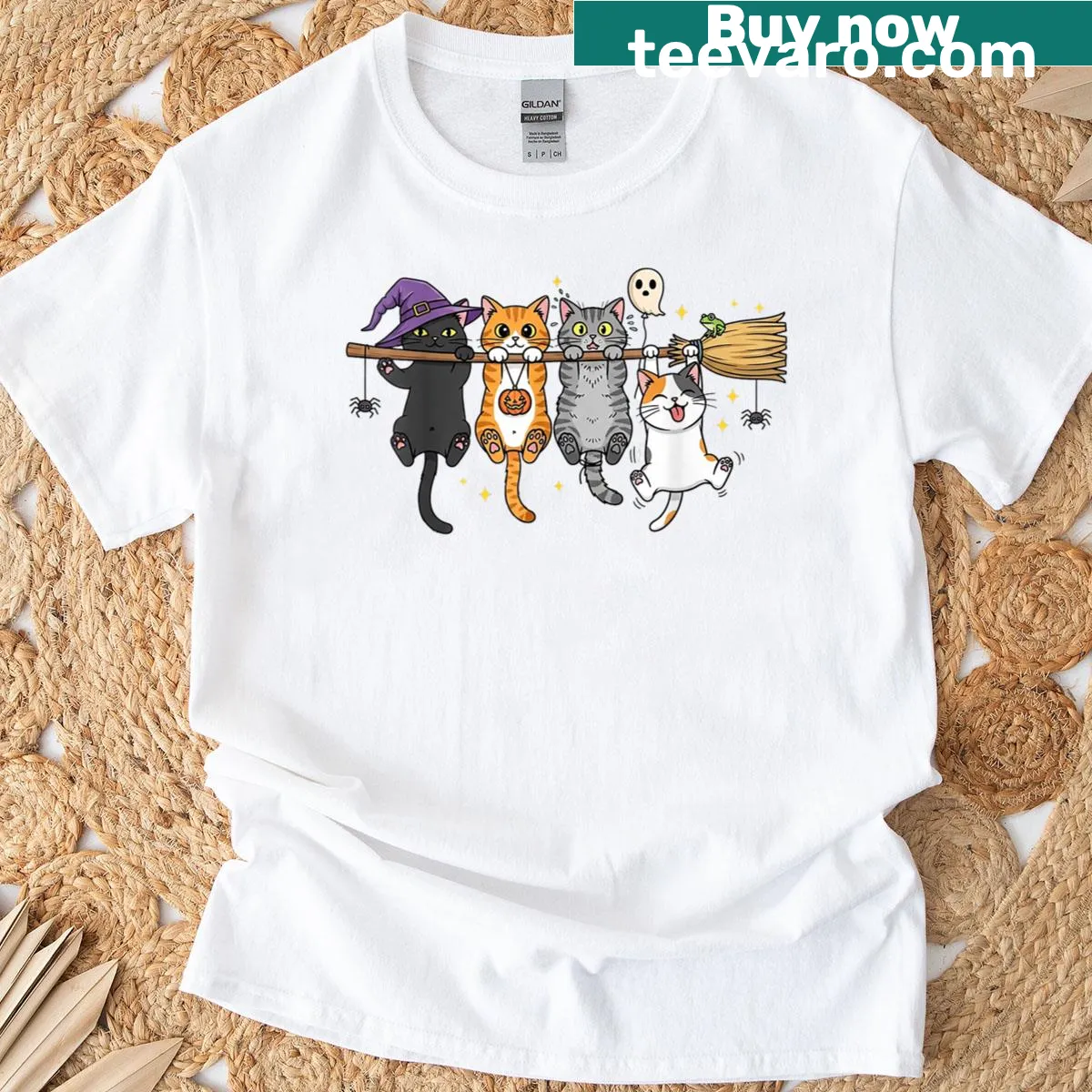 Playful cats graphic on a witch's broom for Halloween t-shirt — on a men's t-shirt