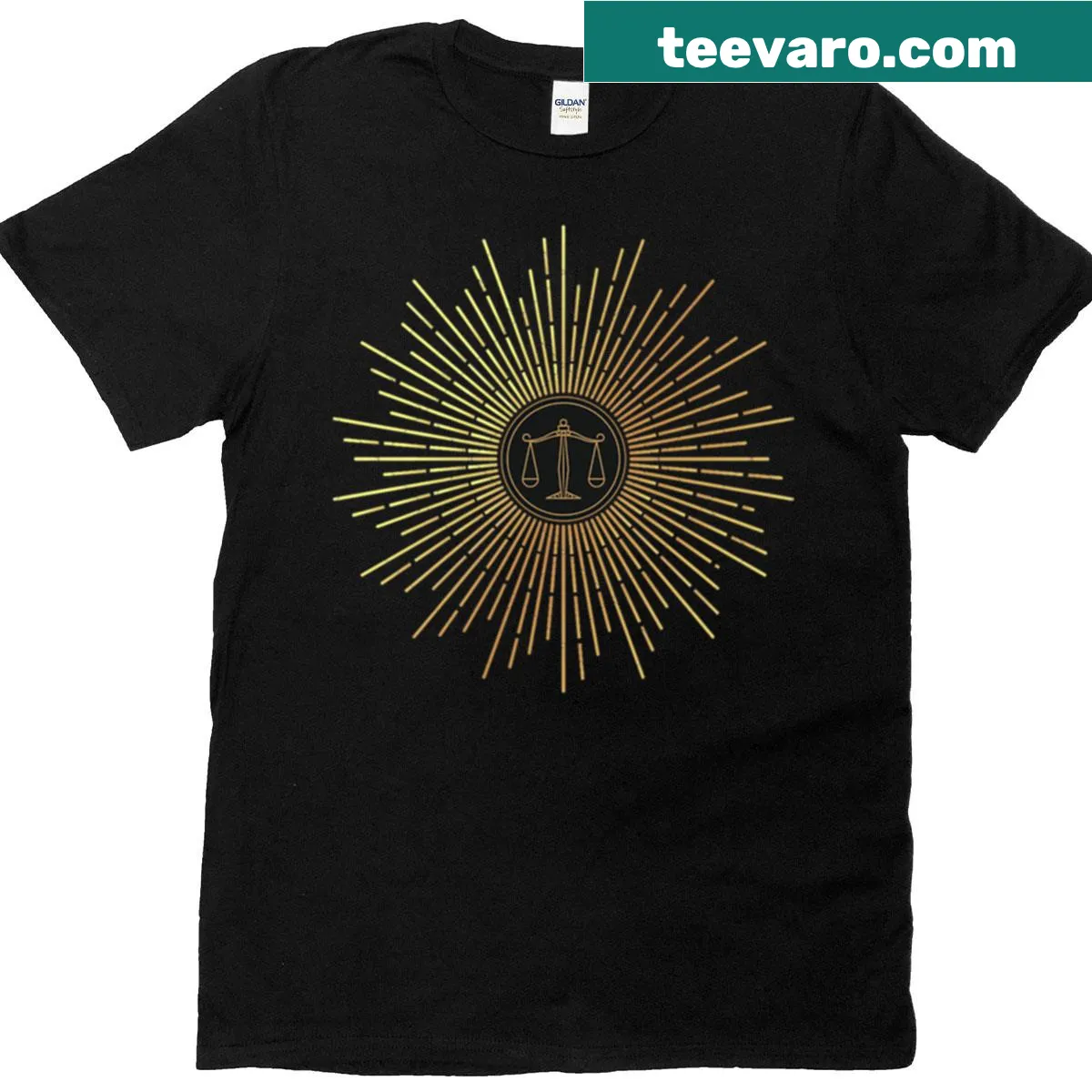 Vintage Libra scales graphic t-shirt with a sunburst design — on a men's t-shirt