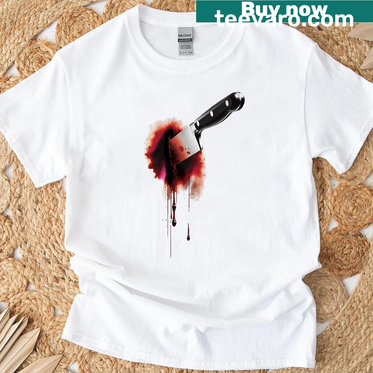 Horror-themed T-shirt featuring a bloody knife graphic — on a men's t-shirt