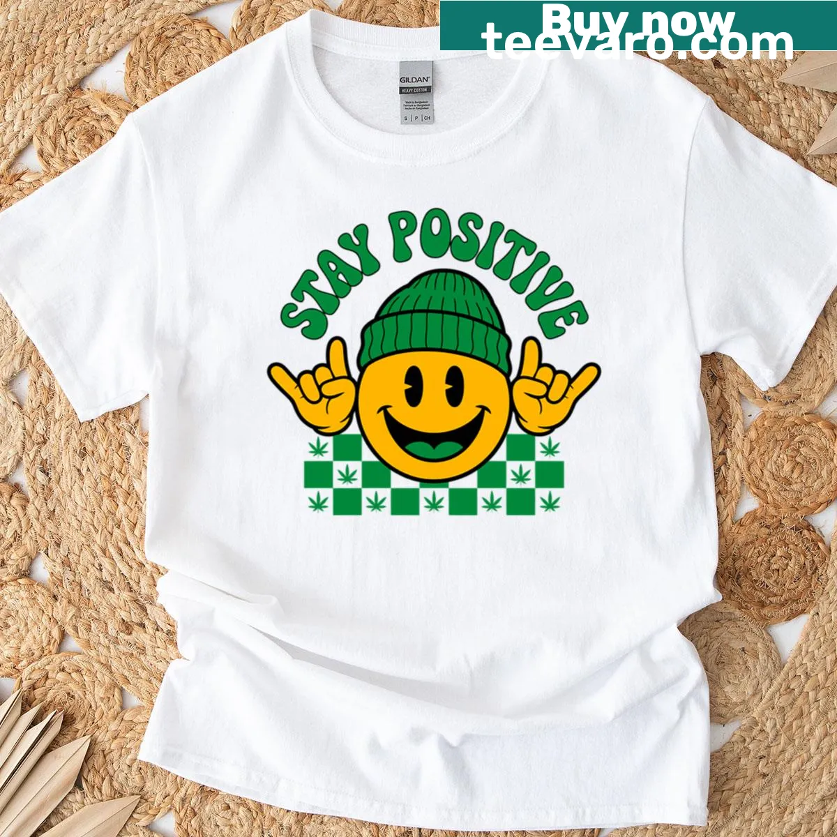 Smiley face wearing a beanie with weed art, positive message — on a men's t-shirt