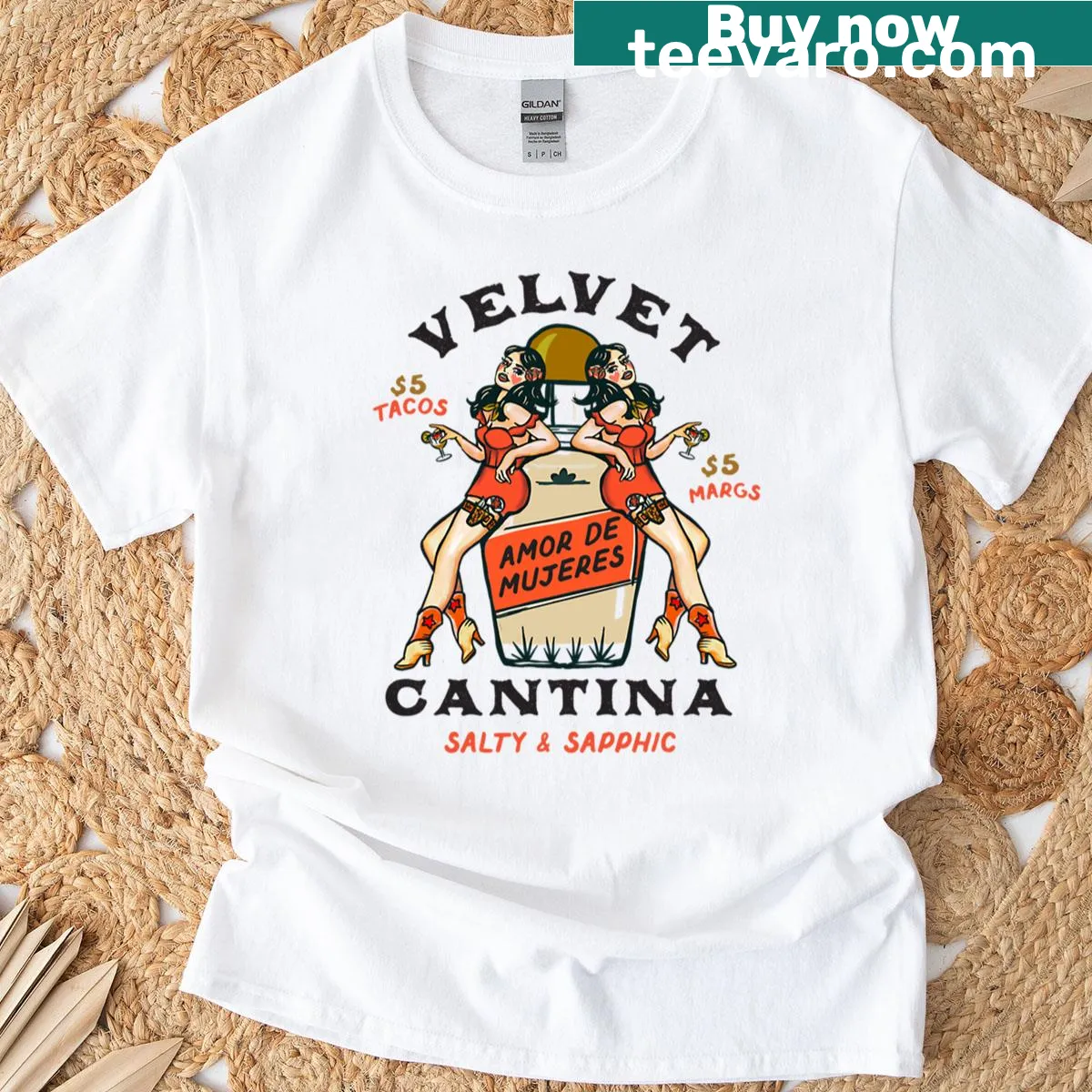 Illustration of pin-up cowgirls enjoying tacos and margaritas on T-shirt. — on a men's t-shirt