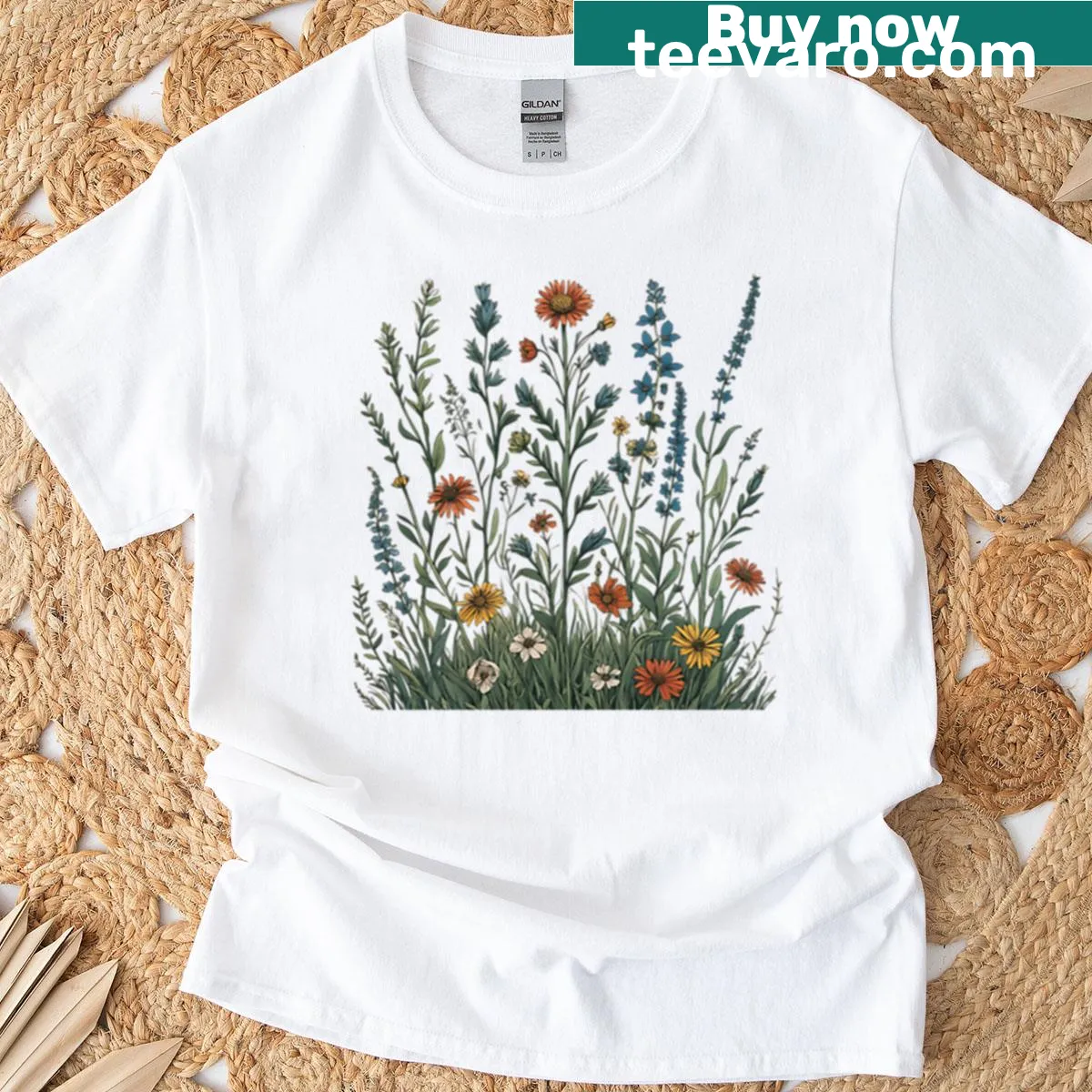 Botanical vintage tee with detailed illustration of meadow flowers in cottagecore style — on a men's t-shirt