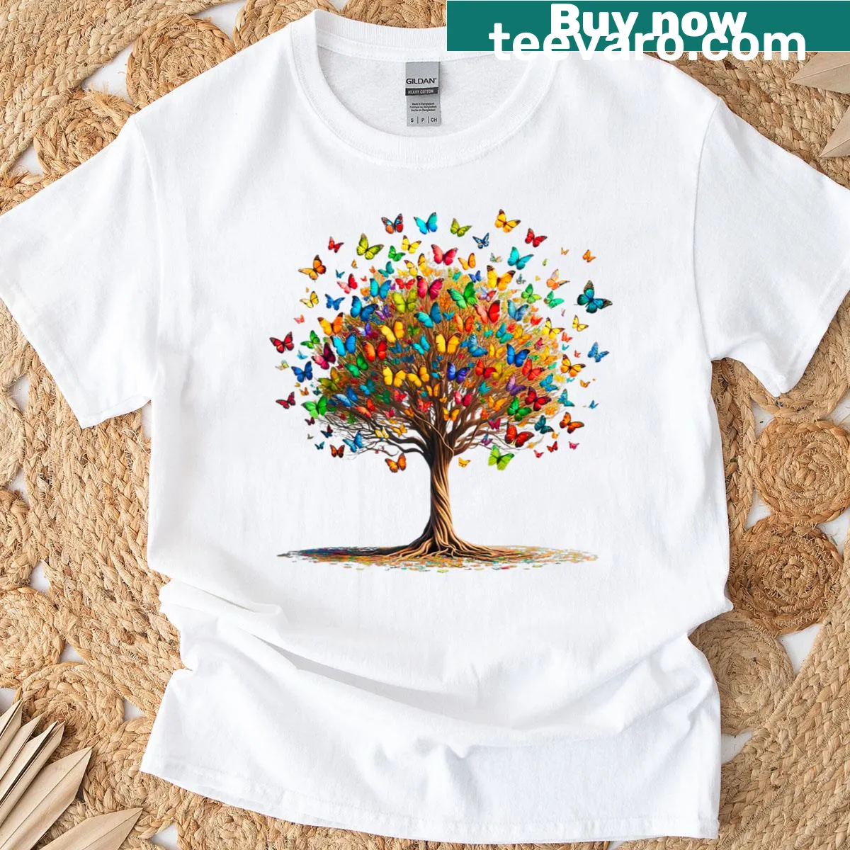 Illustrative T-shirt featuring butterflies around a tree, celebrating nature. — on a men's t-shirt