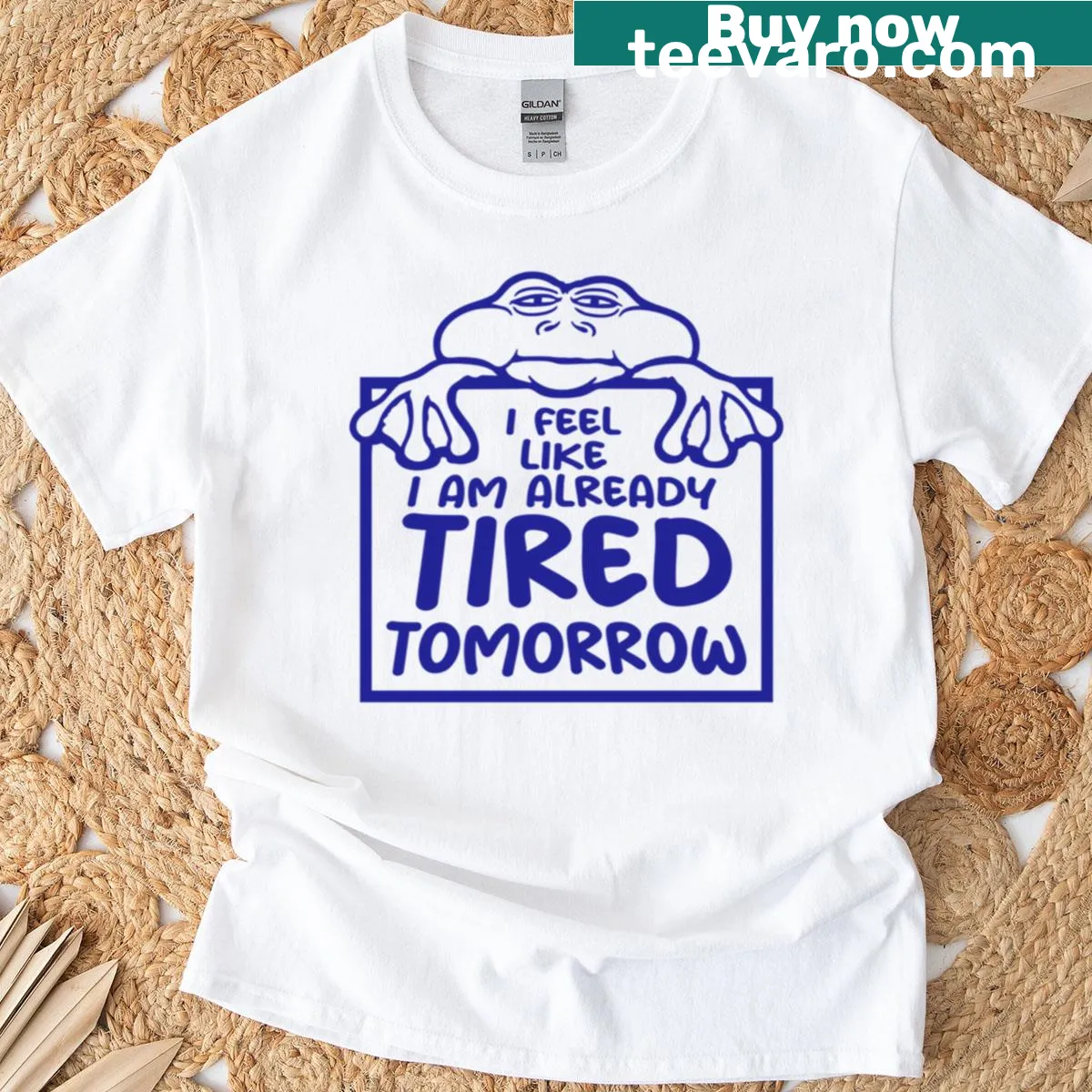 Cartoon T-shirt featuring a frog with a humorous saying about tiredness. — on a men's t-shirt