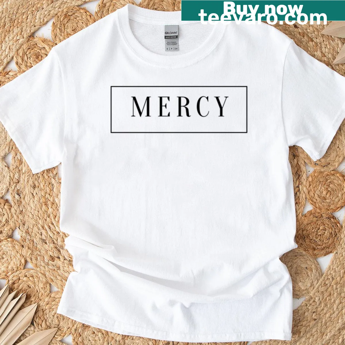 Elegant minimalist t-shirt featuring the word 'Mercy' in modern typography — on a men's t-shirt