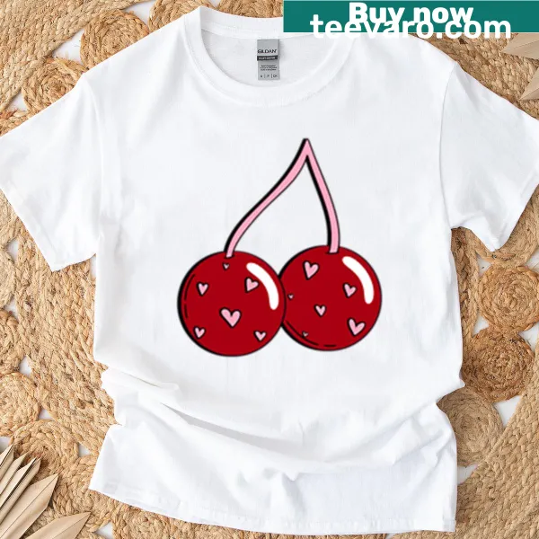 Cute aesthetic t-shirt featuring red cherries and hearts illustration