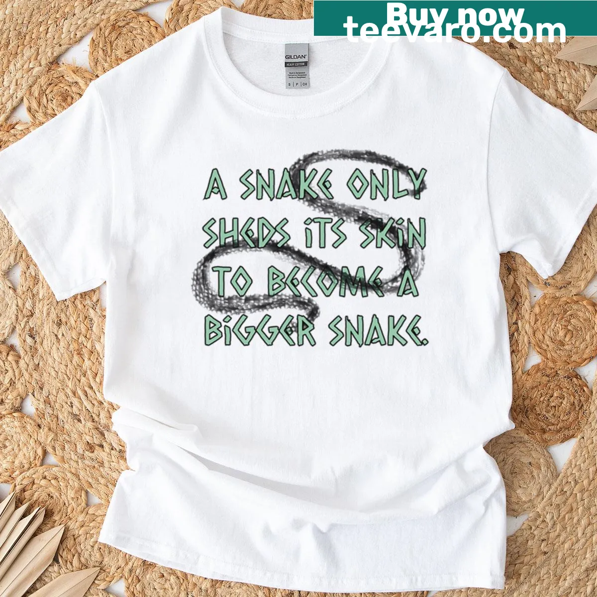 Illustrated snake design t-shirt with intricate details — on a men's t-shirt