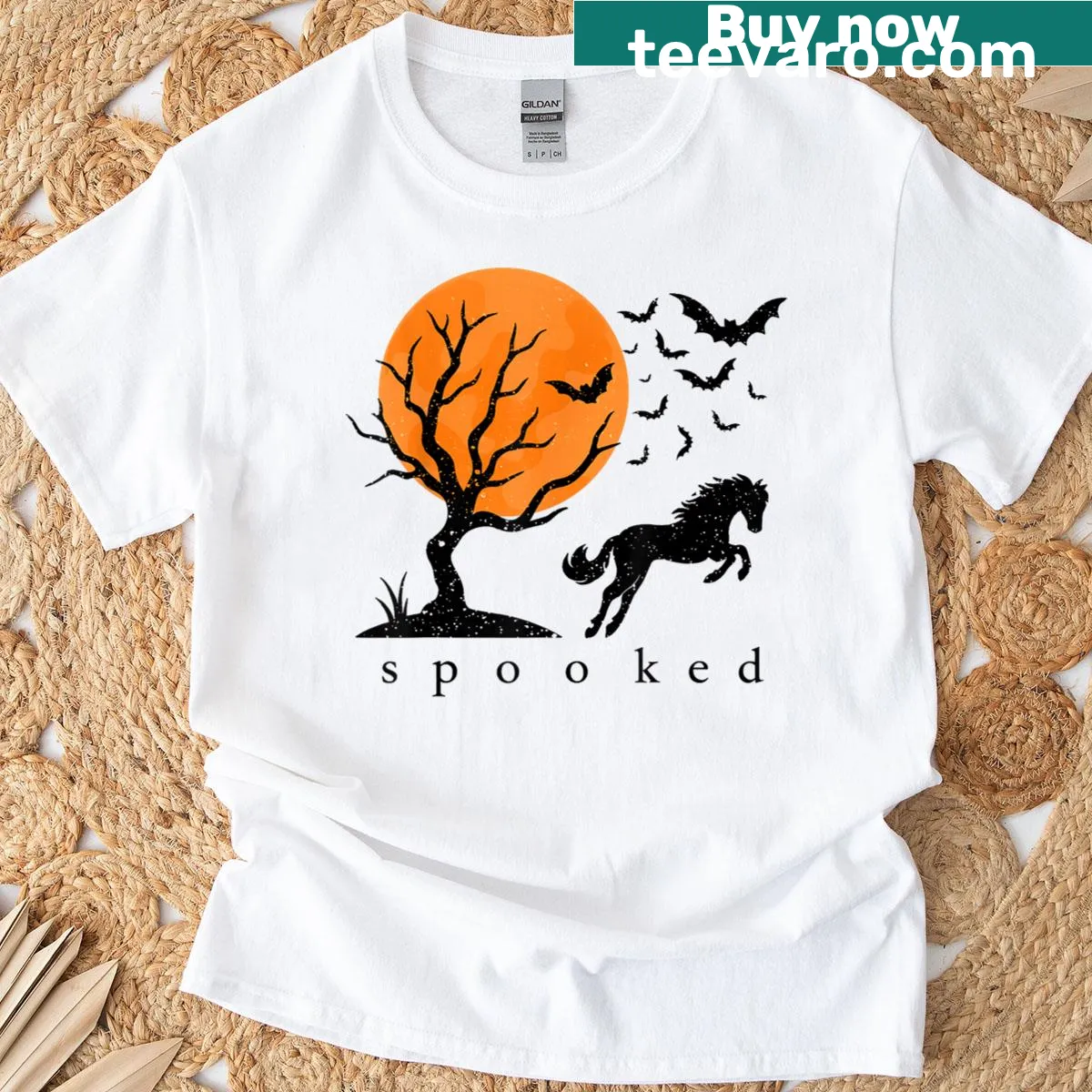 Charming t-shirt featuring a spooked horse, bats, and a moon for Halloween — on a men's t-shirt