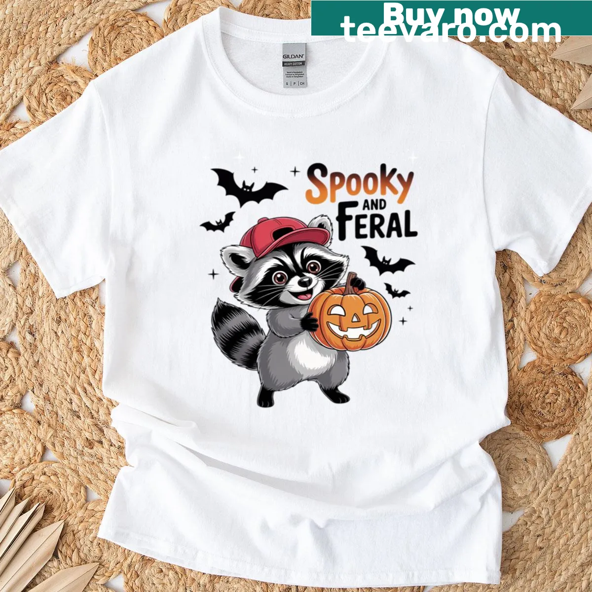 Playful Halloween raccoon graphic T-shirt — on a men's t-shirt