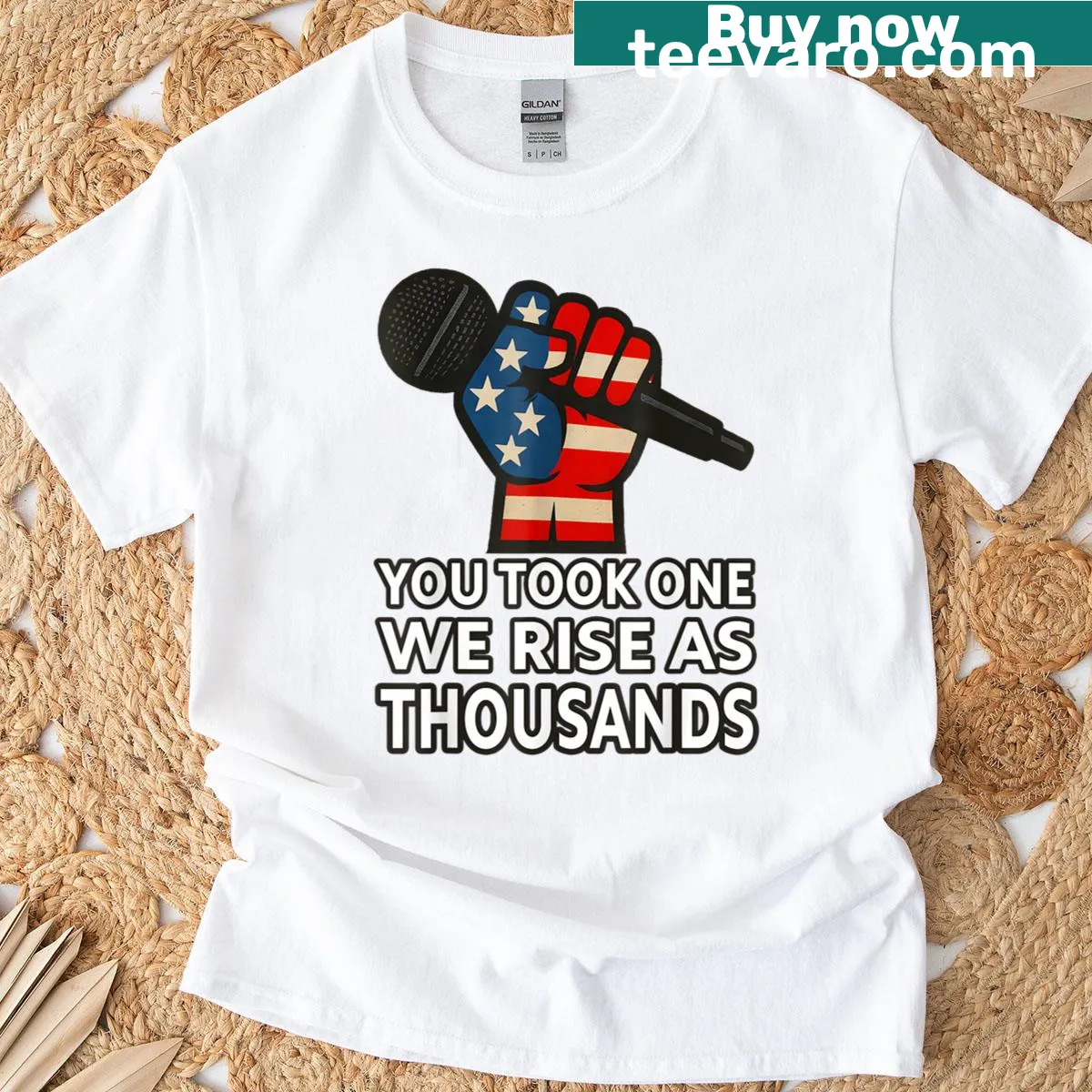 Typography T-shirt with the phrase 'You Took One We Rise As Thousands' — on a men's t-shirt