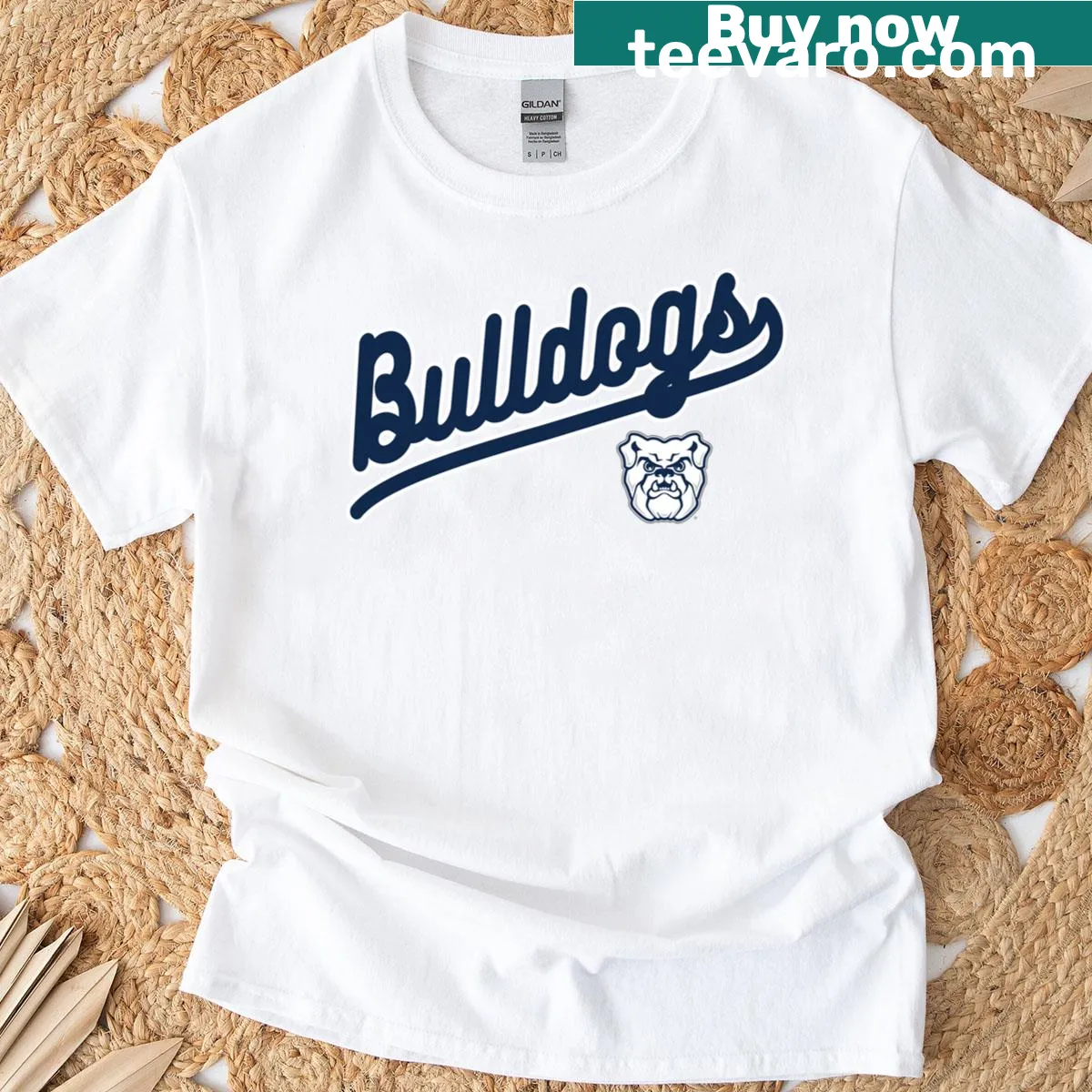 Vintage distressed Butler Bulldogs t-shirt with script over emblem design — on a men's t-shirt