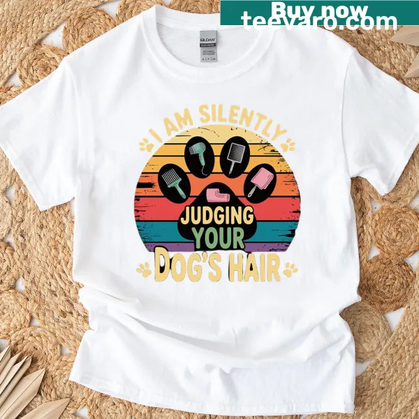Playful cartoon design featuring paw prints on t-shirt.