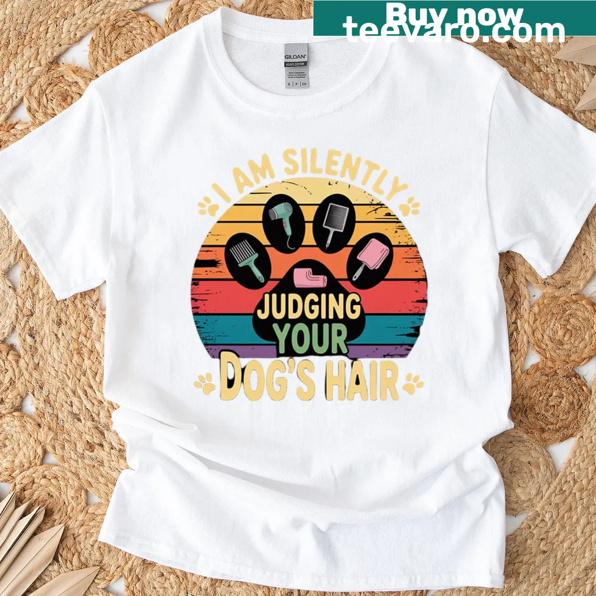 Playful cartoon design featuring paw prints on t-shirt. — on a men's t-shirt