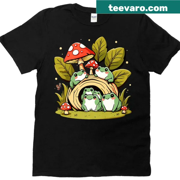 Cottagecore t-shirt featuring whimsical frogs and mushrooms in a forest.