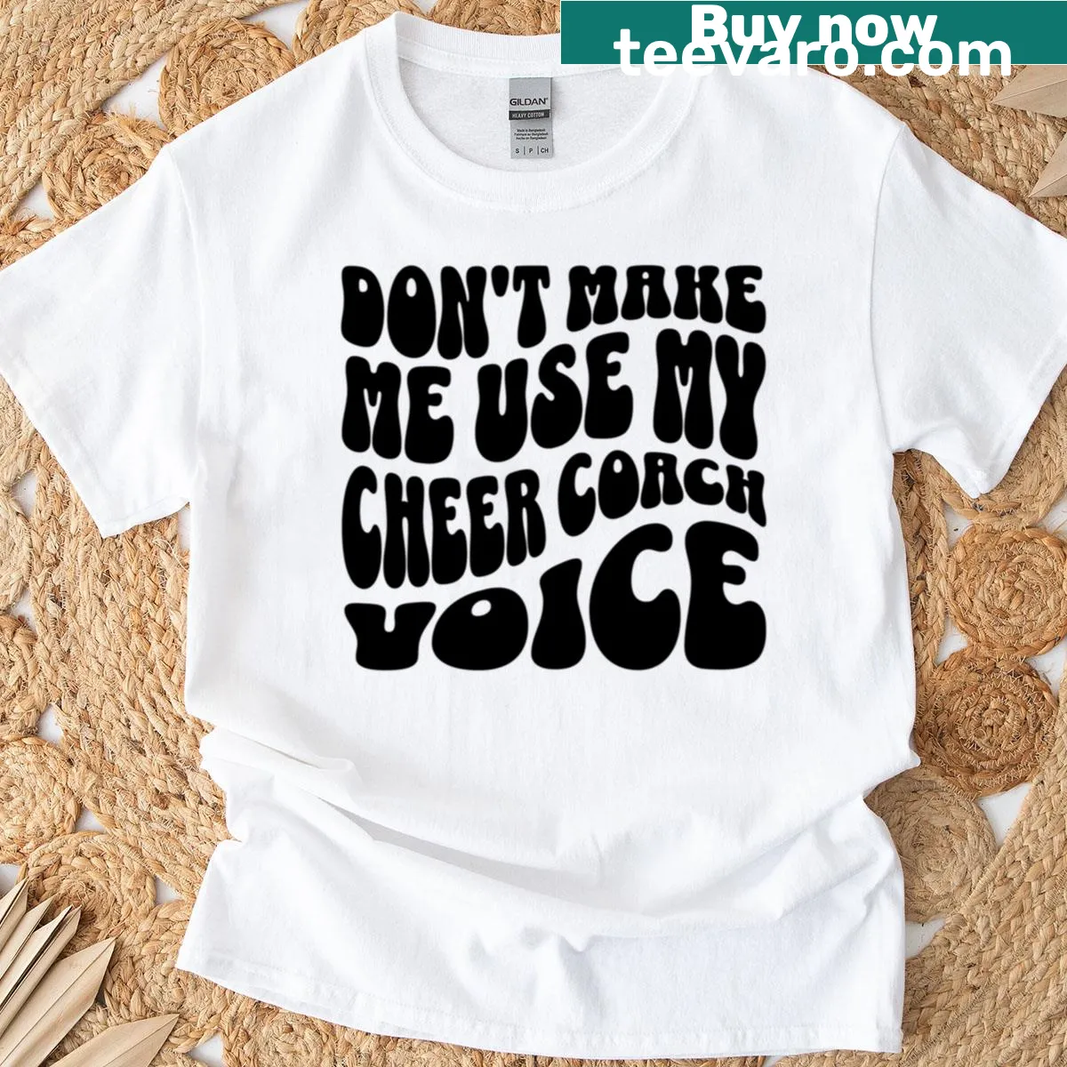 Humorous T-shirt with text warning about using a cheer coach voice — on a men's t-shirt