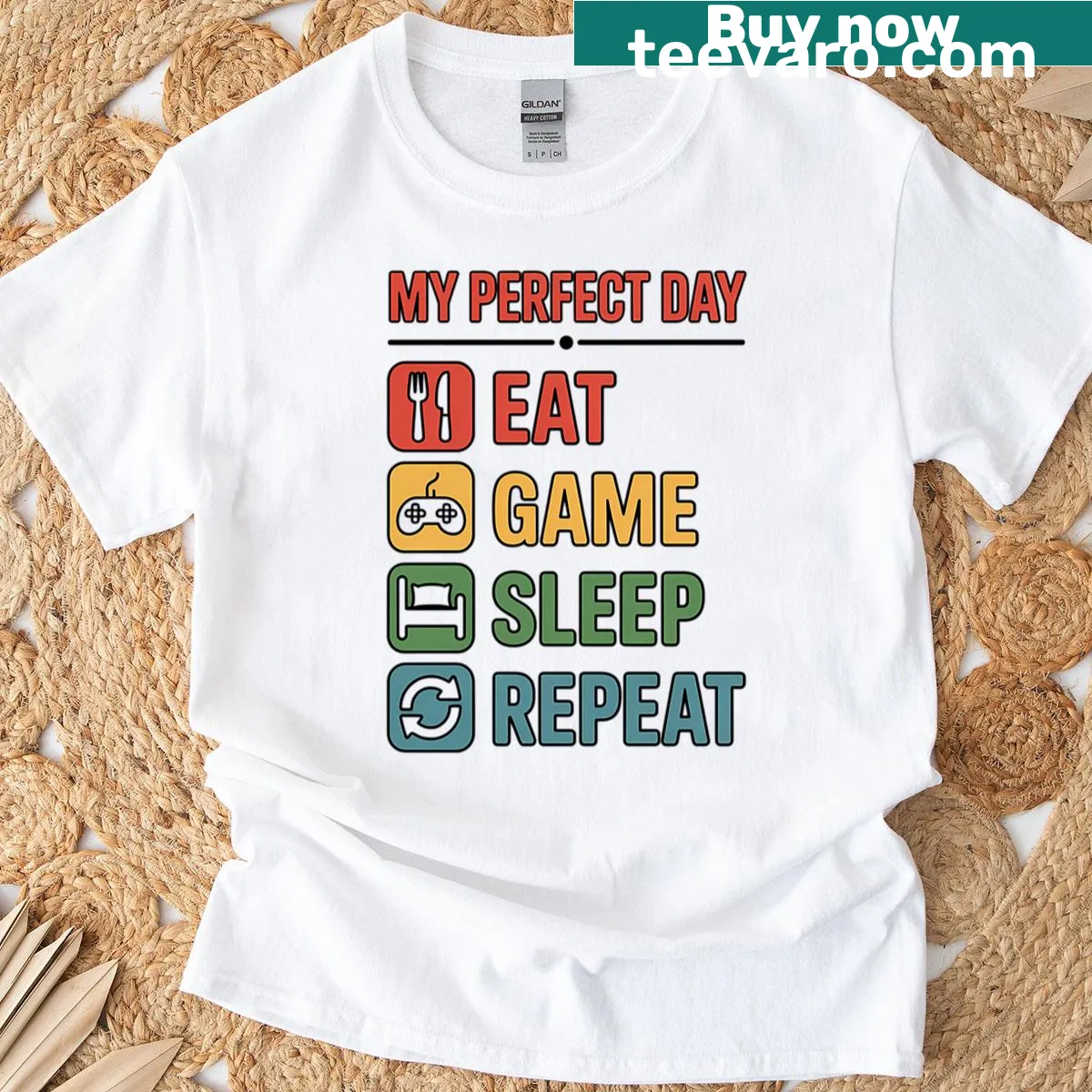 T-shirt with gaming icons and text 'Eat Game Sleep Repeat' — on a men's t-shirt