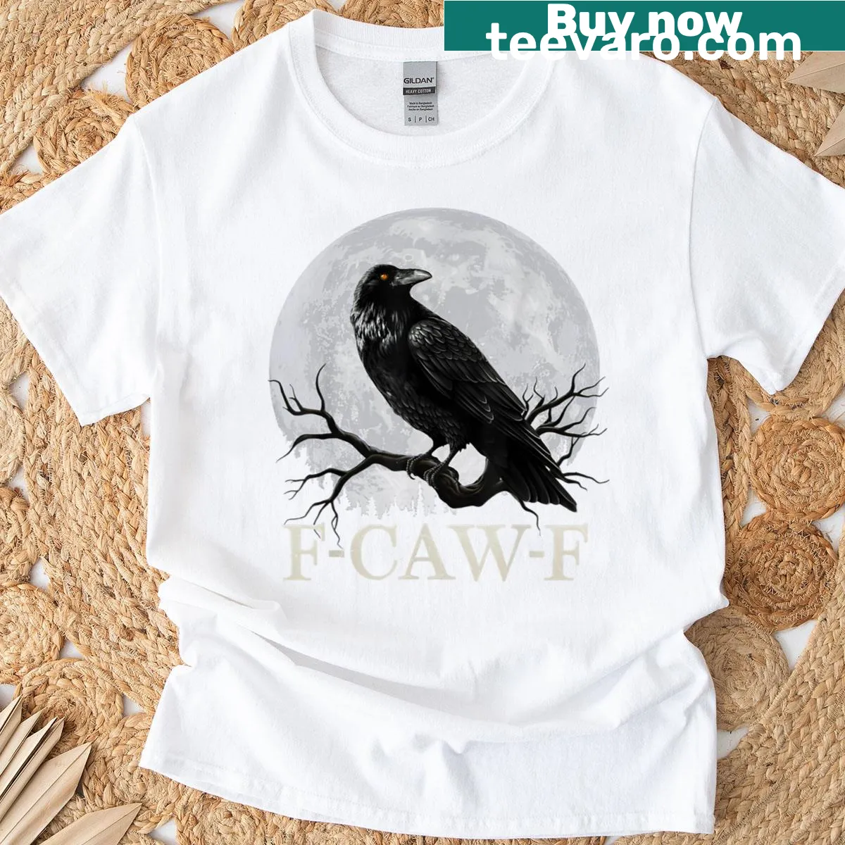 Vintage-style t-shirt with a raven and moon graphic — on a men's t-shirt