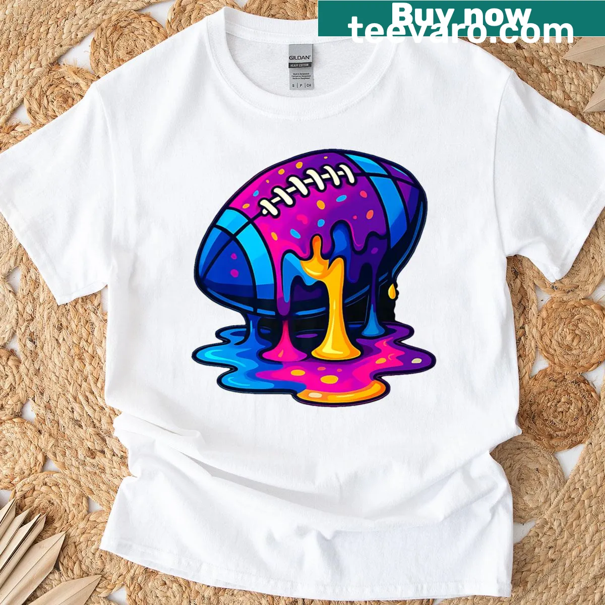 Distressed football-themed t-shirt for kids with drippy graphic — on a men's t-shirt