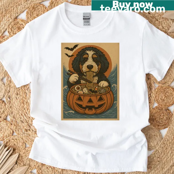 Cartoon graphic of a Bernedoodle, pumpkins, and ramen on T-shirt