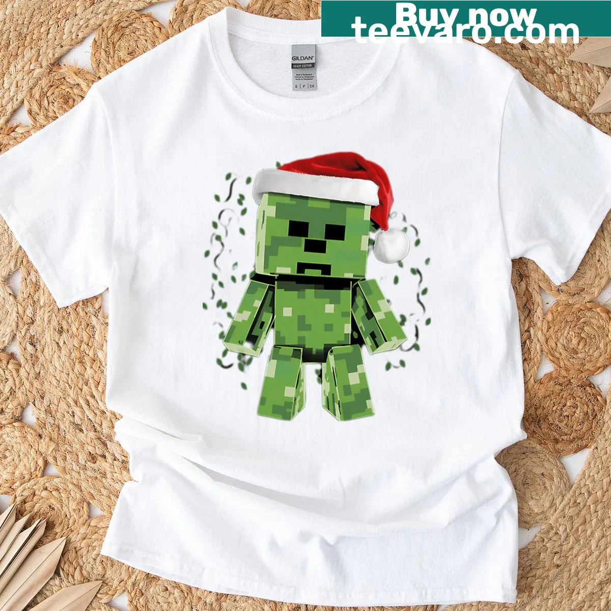 Cartoon green creeper wearing a Santa hat on a T-shirt — on a men's t-shirt