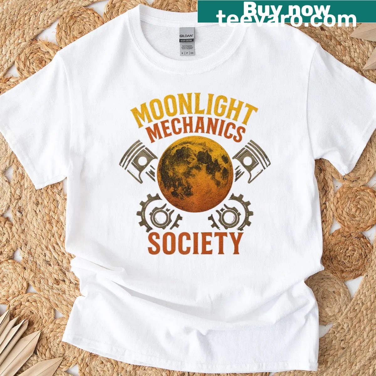 Edgy midnight mechanic t-shirt with piston emblem design. — on a men's t-shirt