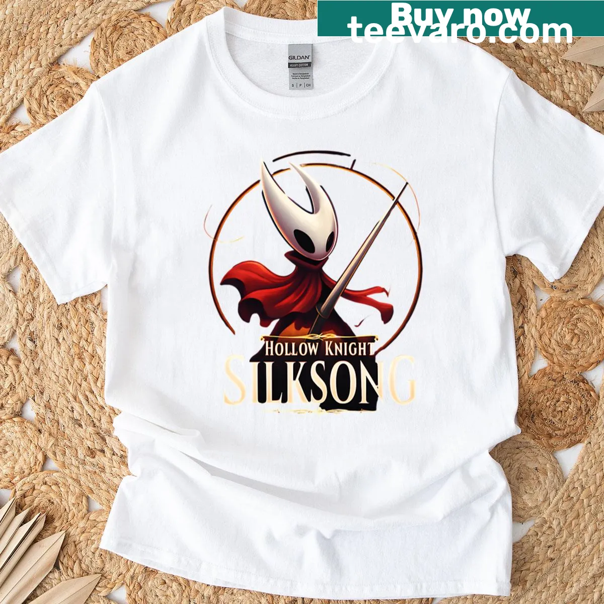 Minimalist golden emblem design for Silksong fans — on a men's t-shirt