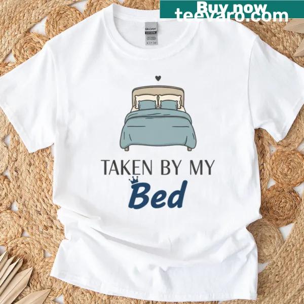 Cozy logo T-shirt with the text 'Taken By My Bed' in playful script