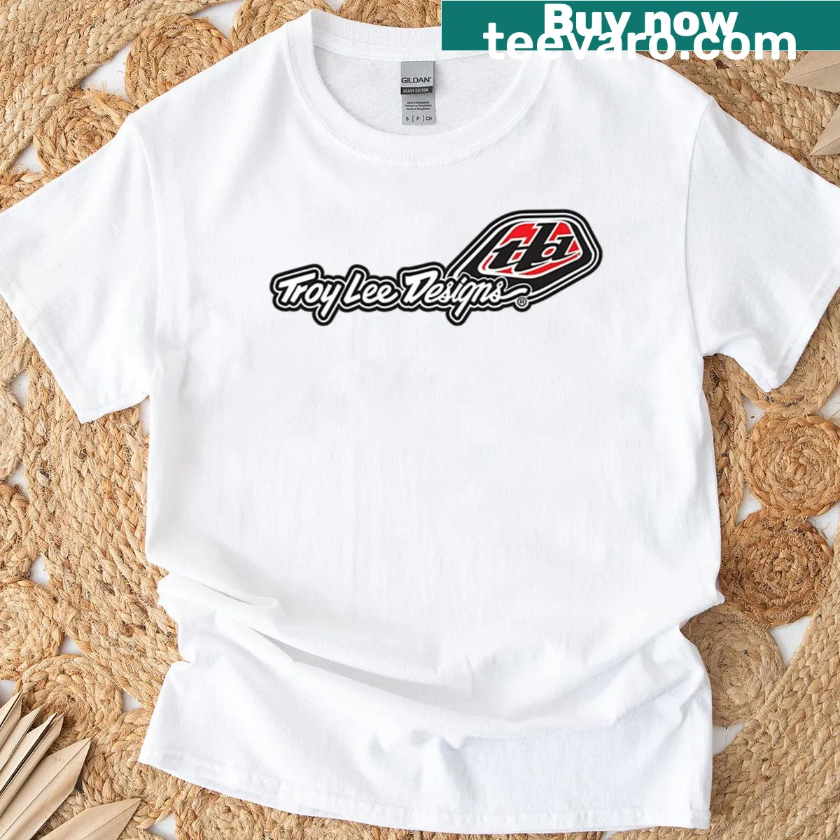 Minimalist typographic Troyleedesign t-shirt with a clean layout. — on a men's t-shirt