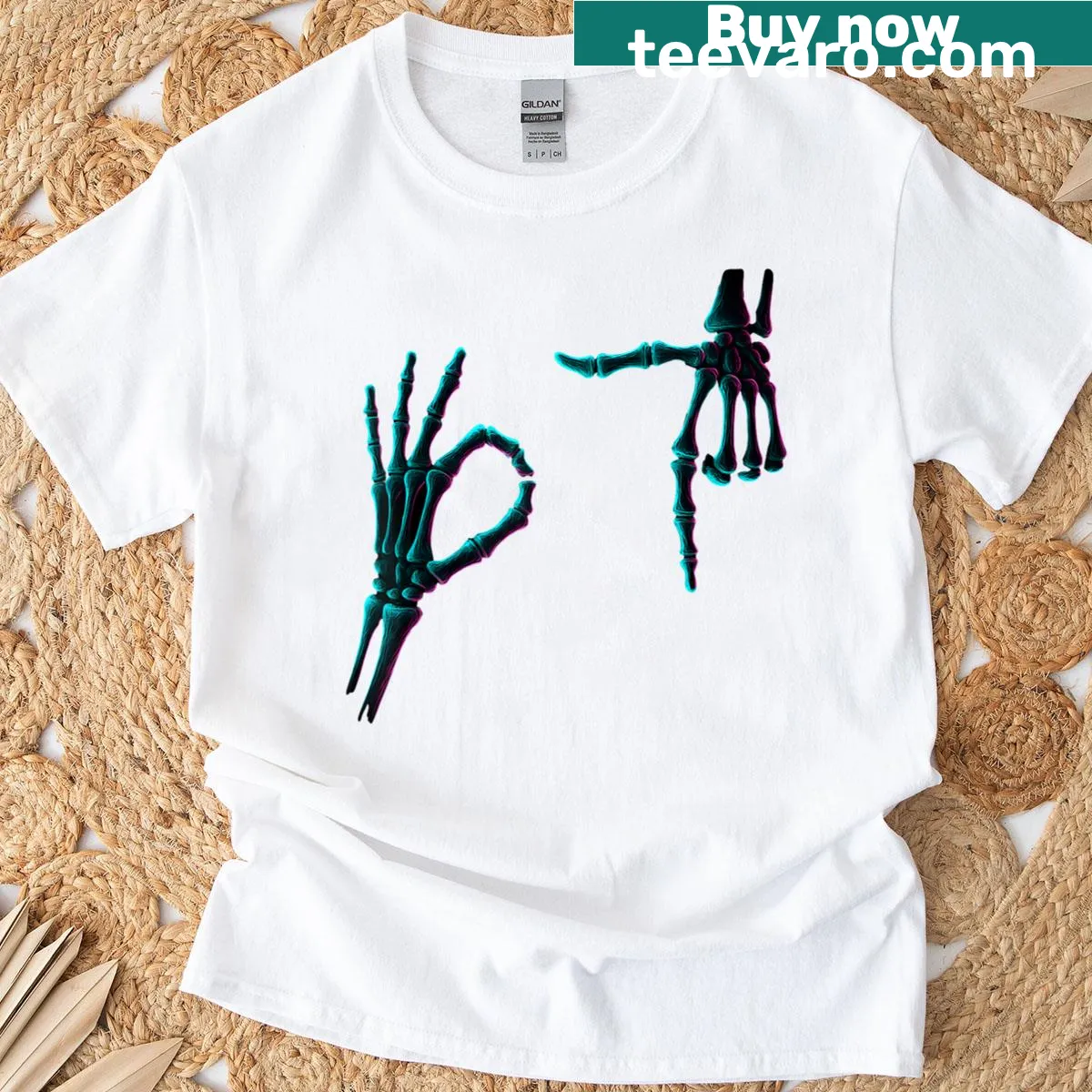 Skeleton hand graphic with text for Halloween-themed t-shirt — on a men's t-shirt