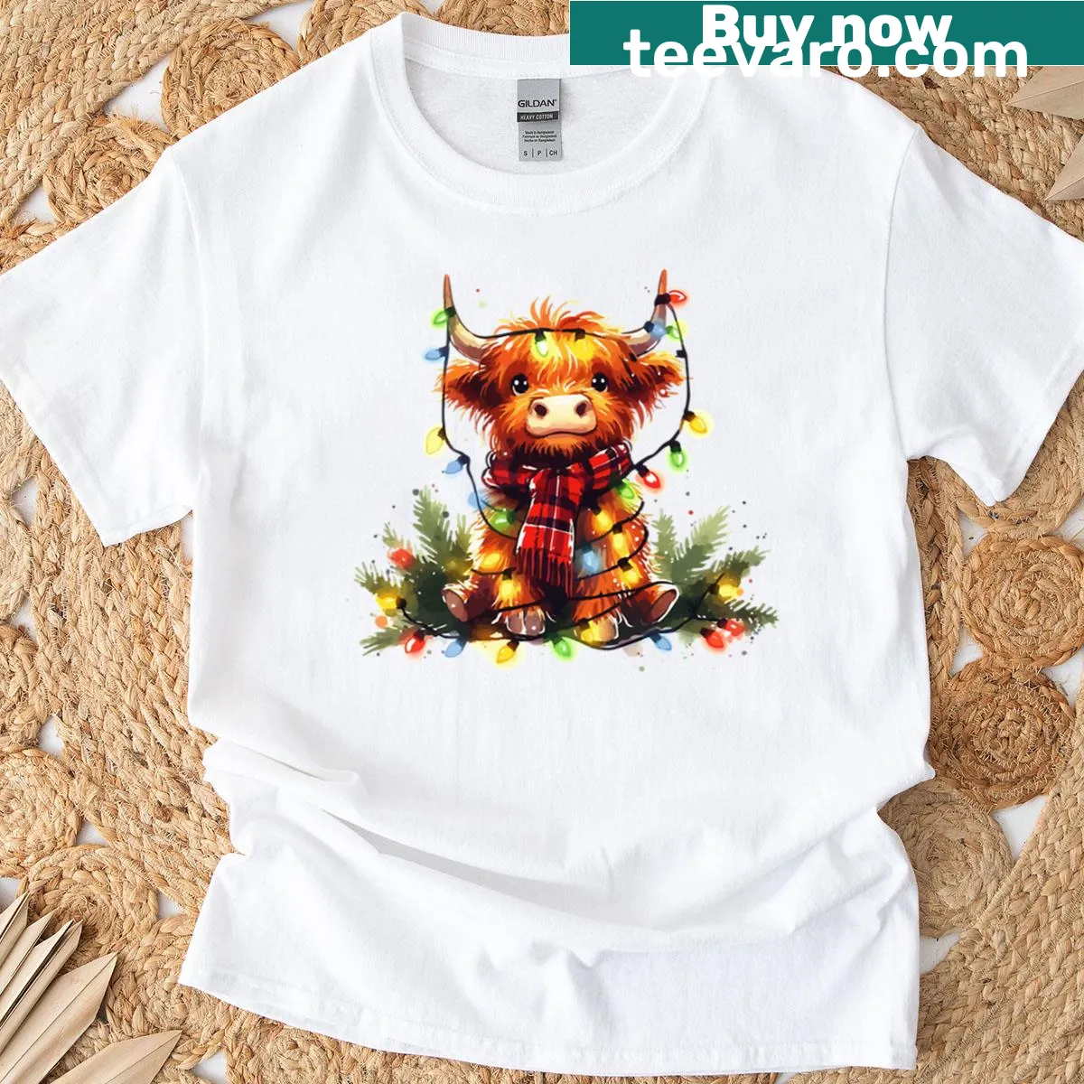 Highland cow illustration with Christmas lights for a festive look — on a men's t-shirt