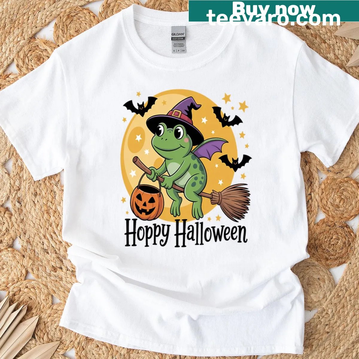 Halloween frog on pumpkin graphic T-shirt — on a men's t-shirt