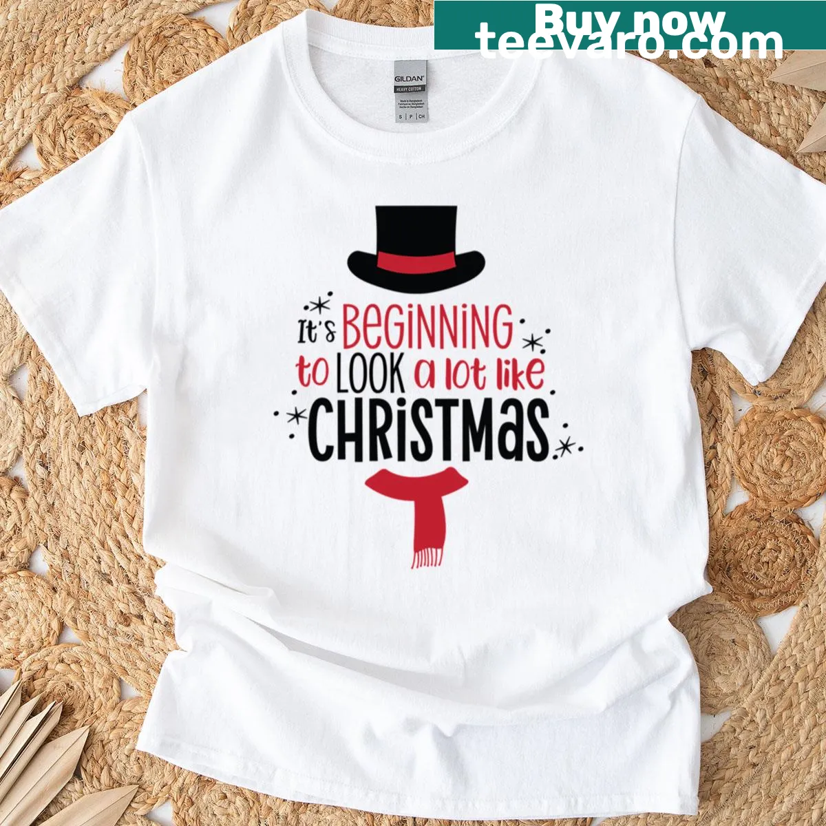 Oversized T-shirt with the phrase 'It's Beginning To Look A Lot Like Christmas' and festive illustrations — on a men's t-shirt