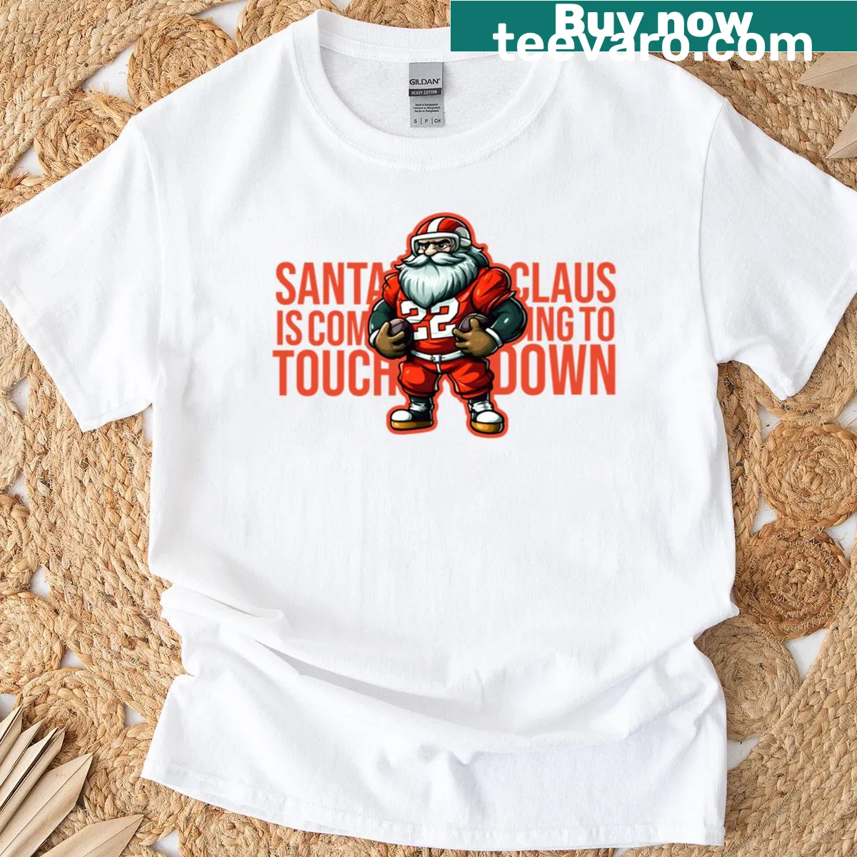 T-shirt featuring Santa Claus playing football in a playful illustration — on a men's t-shirt