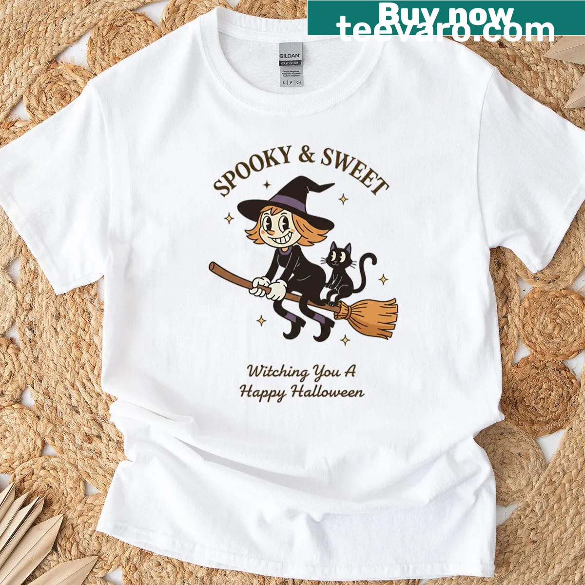 Retro witch on broom with black cat cartoon T-shirt — on a men's t-shirt