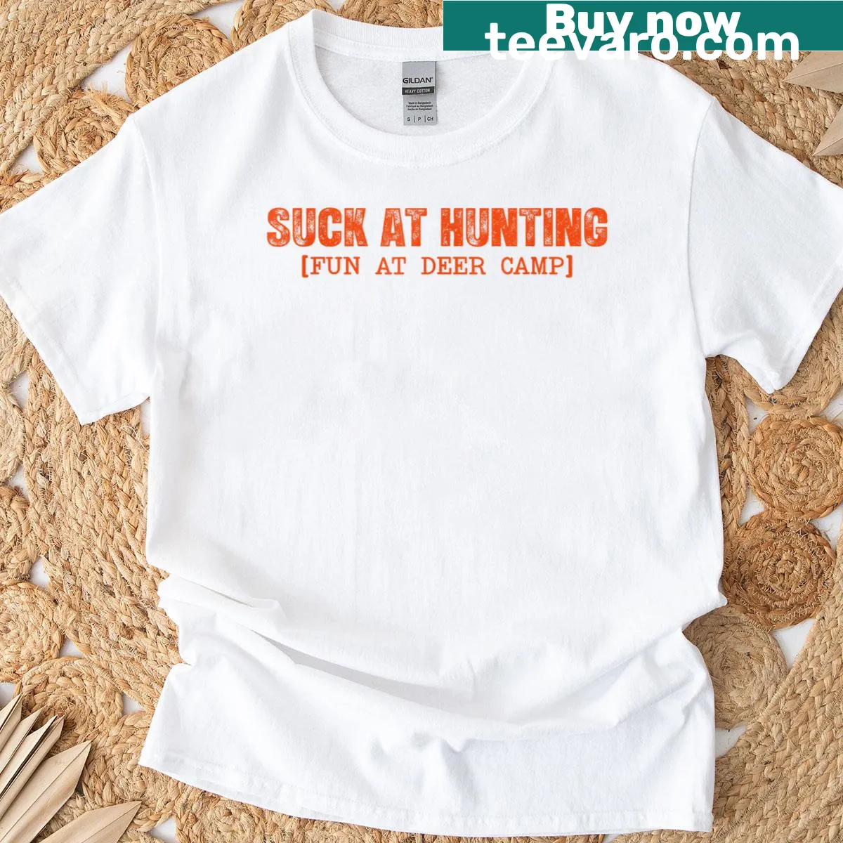 Funny hunting T-shirt with 'Suck At Hunting' text design — on a men's t-shirt