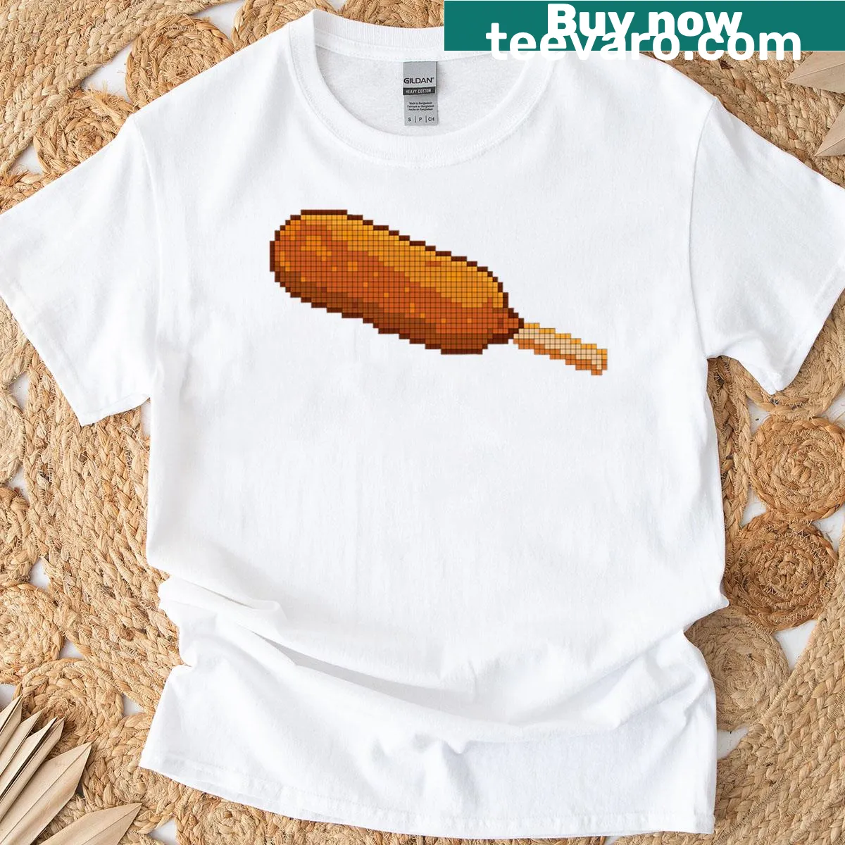 Cartoon-style 8-bit graphic of a corndog on a premium t-shirt — on a men's t-shirt